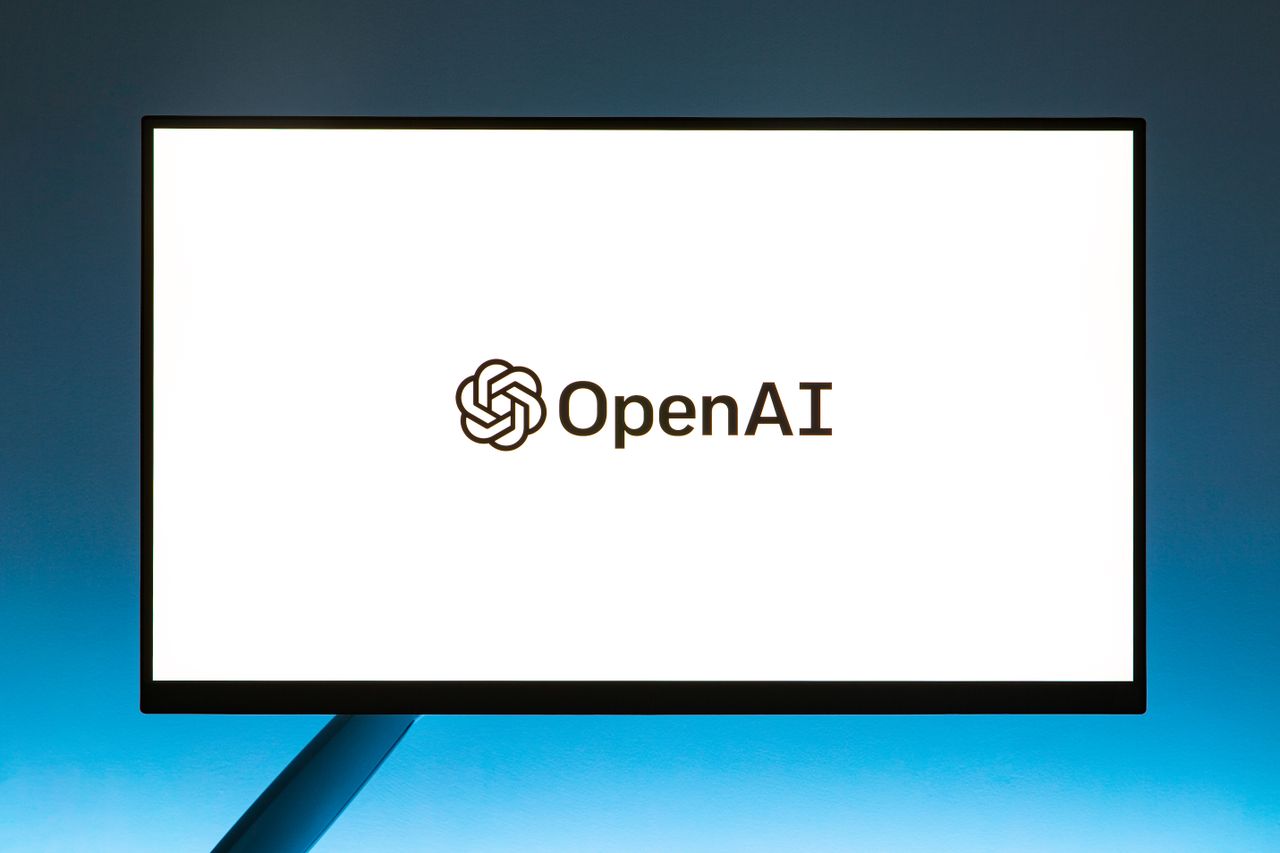 Mastering the First Impression: Your intriguing post title goes here Minimalistic display of OpenAI logo on a monitor with a gradient blue background, representing modern technology.
